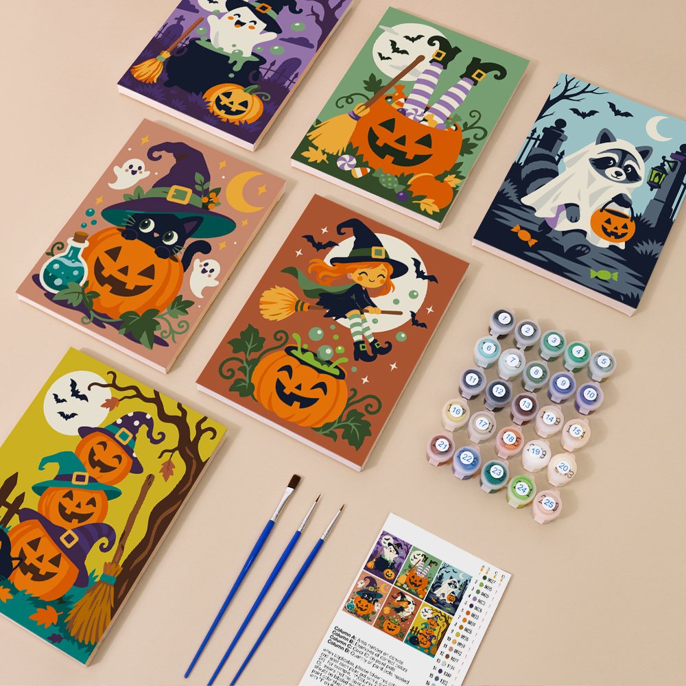 Painting one of the Witchy Pumpkin Patch designs next to a stack of mini canvases