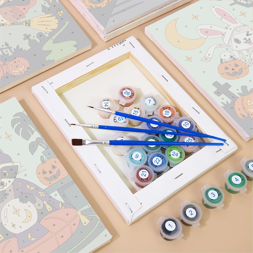 Numbered paint pots and brushes on a pre-stretched Woodland Costume Party mini canvas