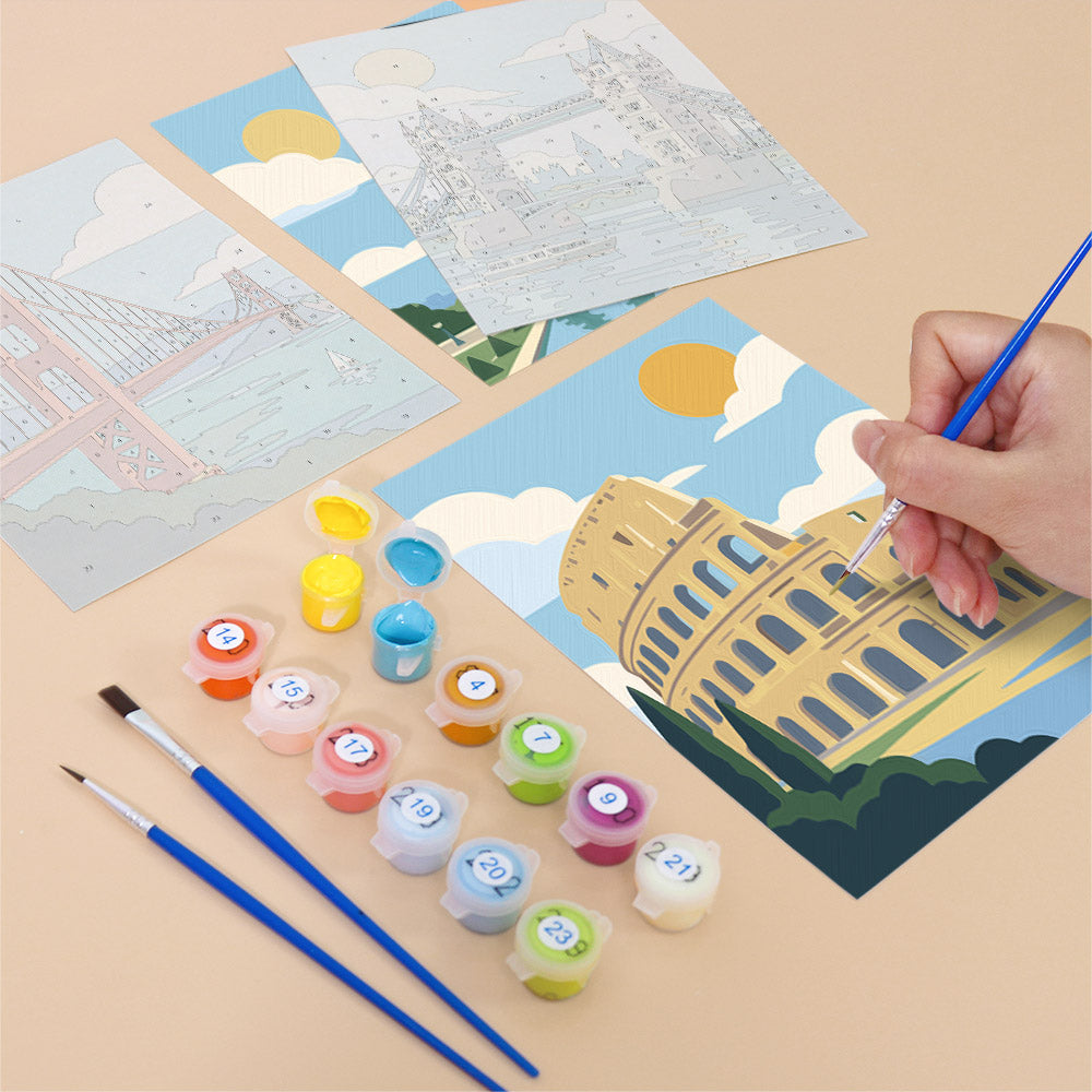 Filling in a World Landmarks mini canvas with numbered acrylic paints and a fine brush