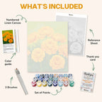 What's included in the Yellow dahlias paint by numbers kit: numbered linen canvas, reference sheet, color guide, 24 acrylic paints, 3 brushes and thank you card
