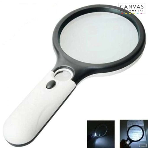 Handheld magnifying glass with 3X and 45X lenses and LED lights for paint by numbers
