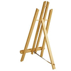 Artist wood easel for paint by numbers standing on a table, ready for a canvas