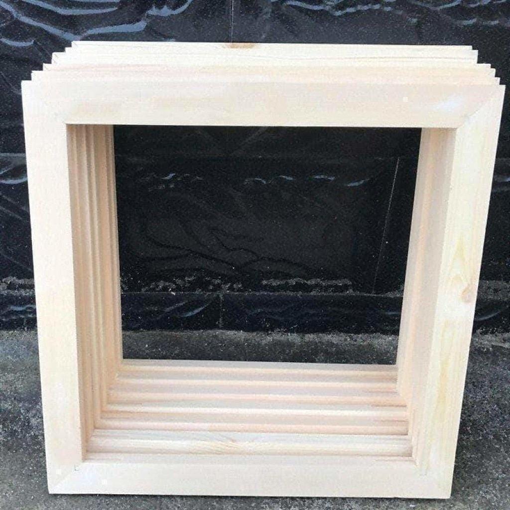 Unassembled pine wood stretcher bars from a paint by numbers canvas frame kit