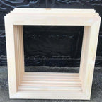 Unassembled pine wood stretcher bars from a paint by numbers canvas frame kit